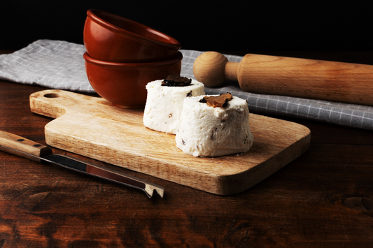 TOMINO TARTUFO NERO 100g al latte vaccino